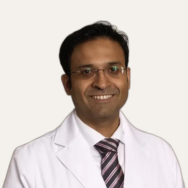 Dr. Keshav Magge