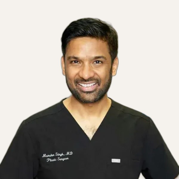 Dr. Mansher Singh