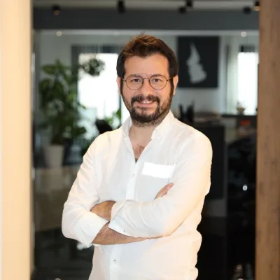 Dr. Candan Mezili